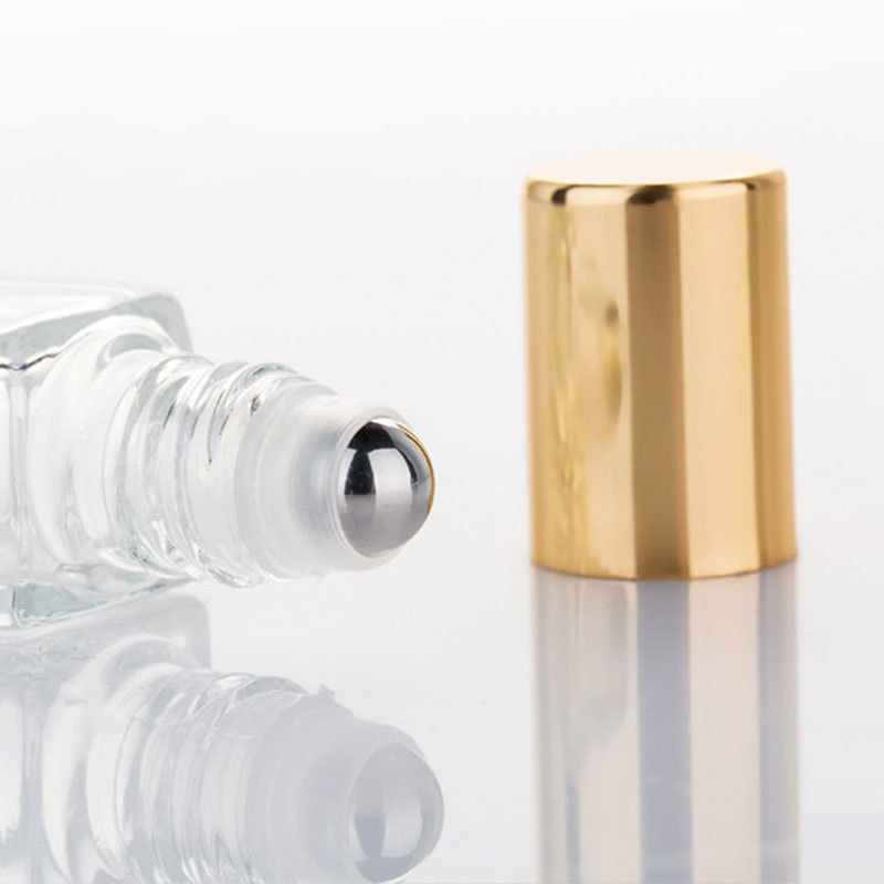 エッセンシャルオイルガラスボトル空のクリアクマ型スチールロー - On Perfume & Fragrance Kota Bogor のレビューと価格